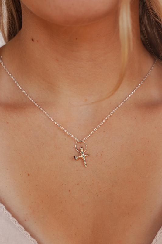 Nail Cross with Garnet Stones