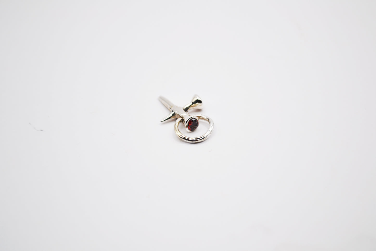 Nail Cross with Garnet Stones