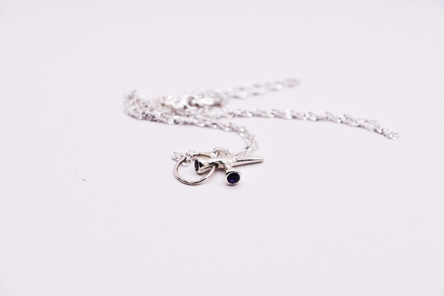 Nail Cross with Garnet Stones